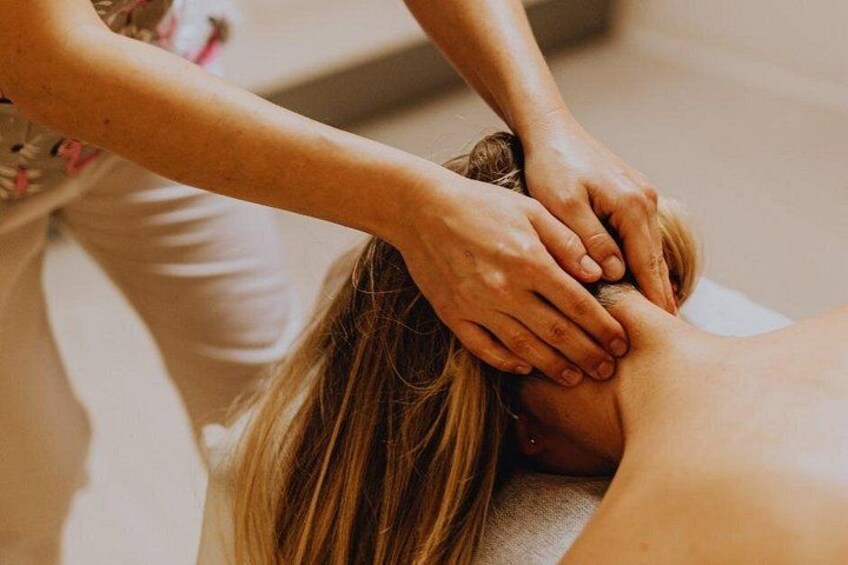 A person receiving a massage. 4