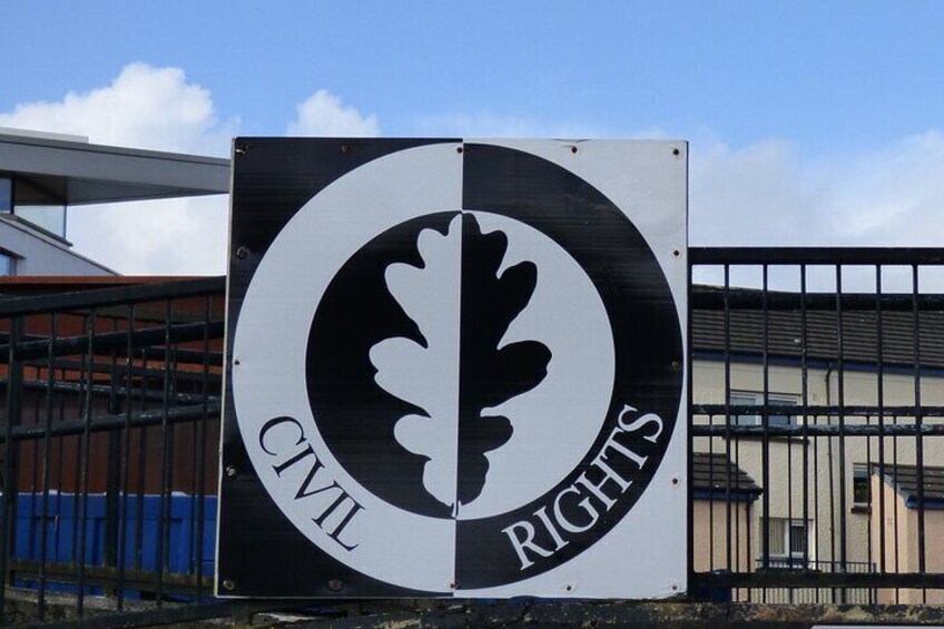 A sign with a leaf and the words "Civil Rights" on it. 4