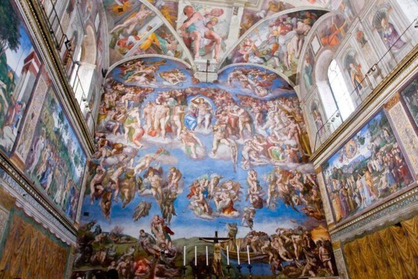 A detailed fresco mural in a grand hall with classical figures and architectural elements. 4