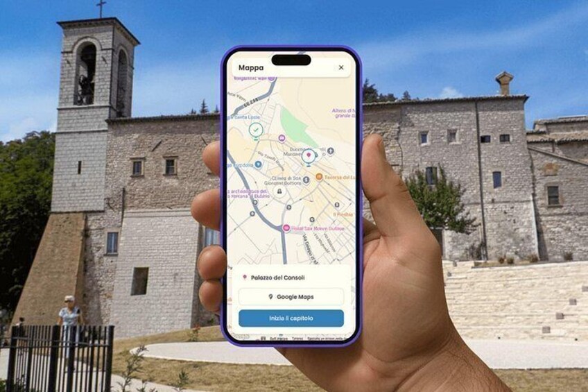 A hand holding a smartphone displaying a map with a historical building in the background. 3