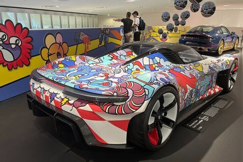 A colorful sports car with a vibrant, cartoon-themed paint job. 4
