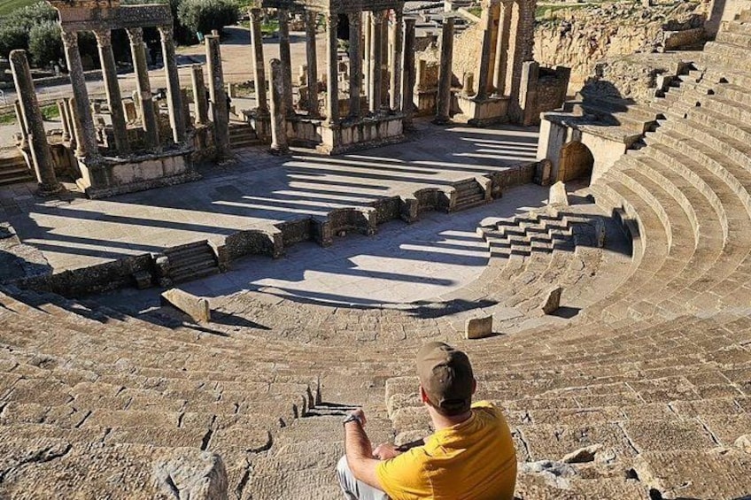 Ancient ruins with a theater and columns. 1