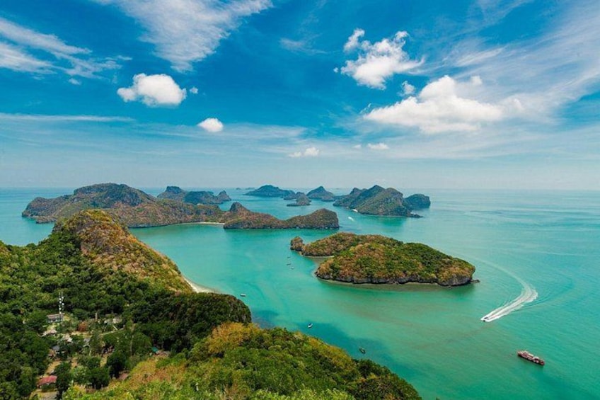 A coastal landscape with multiple islands surrounded by turquoise waters. 2