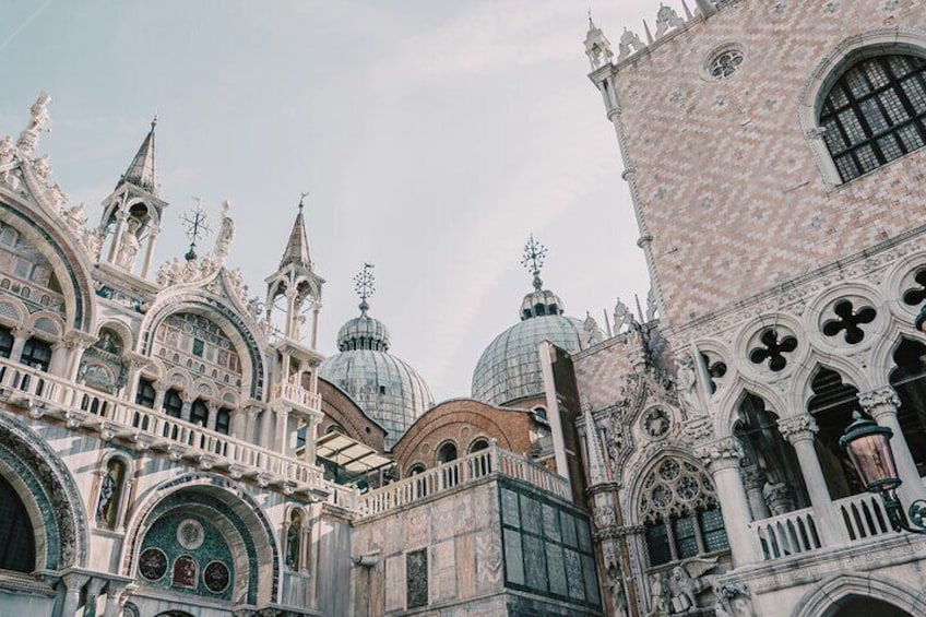 Ornate Venetian architecture with domes and intricate designs. 5