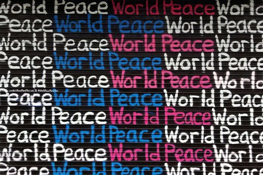 A black background with the word 'World Peace' written in multiple colors. 5