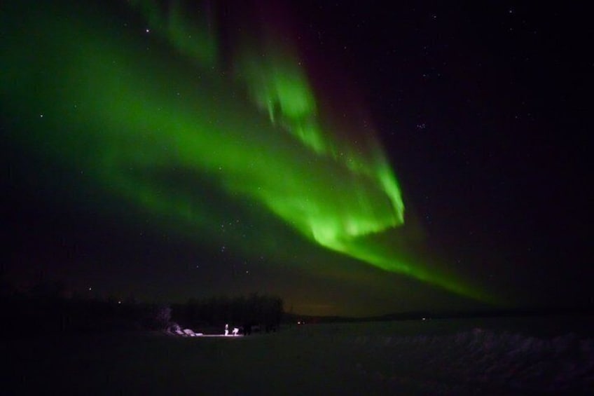 The Northern Lights over a snowy landscape. 2