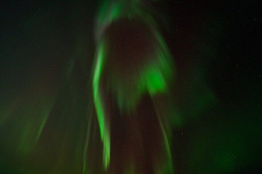 A night sky with green aurora borealis. 5