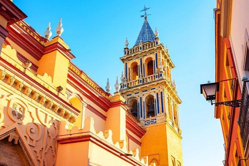 A historic building with ornate architecture and a prominent bell tower. 3