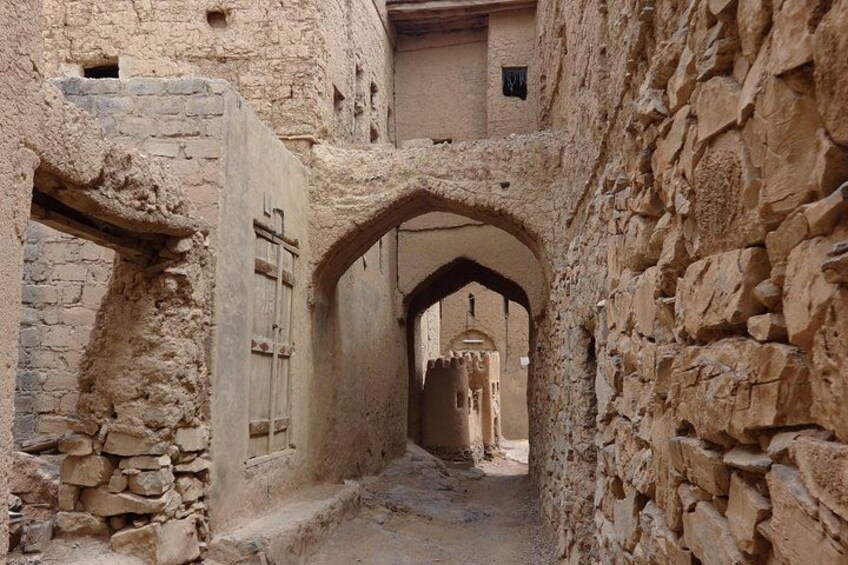 An ancient stone archway in a narrow passageway. 2