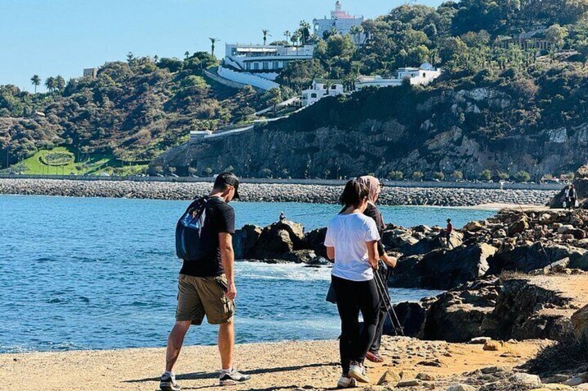 Walking along the hiking Tangier coastal path with views of Tangier’s elegant white houses overlooking the sea 5