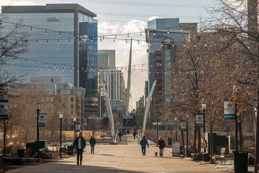 The Denver Millennium Bridge offers panoramic views of the skyline and rail yards below. 2