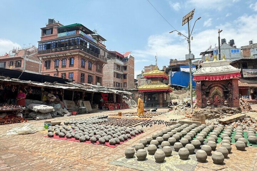 A market with stone balls and a small shrine. 4
