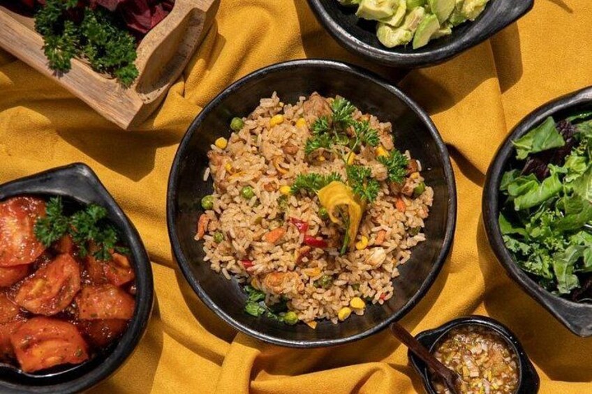 A variety of dishes including fried rice, a salad, and a bowl of soup. 4