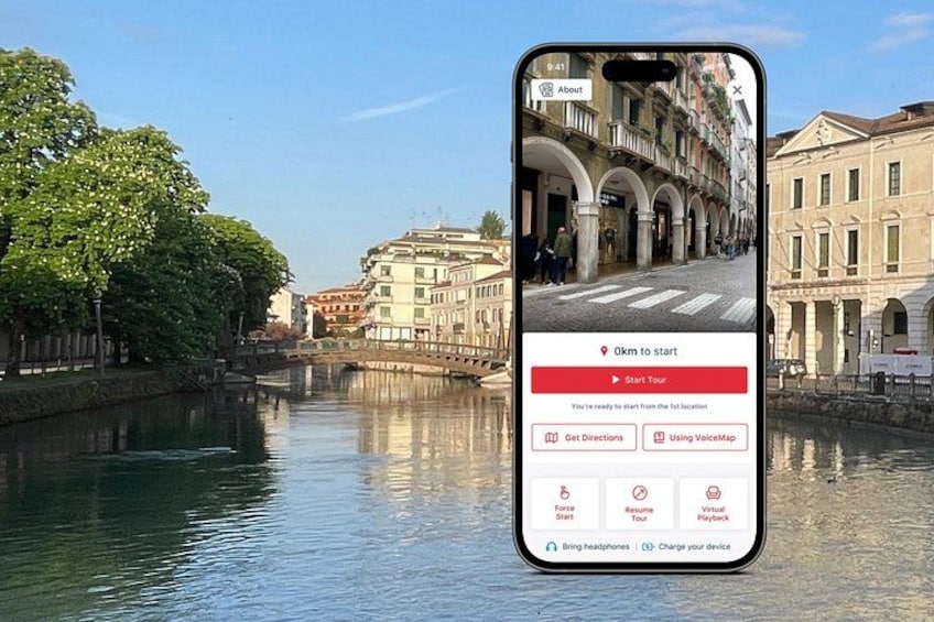 A smartphone displaying a travel app with a canal view. 1