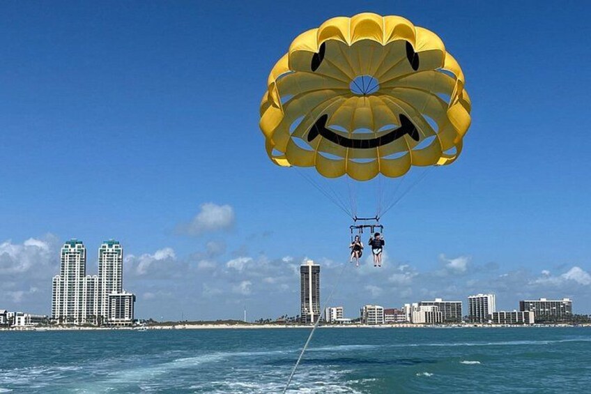 Fly over the Gulf Of Mexico Parasailing with Sonny’s Beach Service. 1