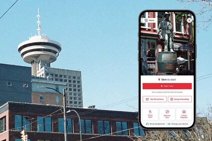 A smartphone displaying a map with a tower and statue in the background. 1