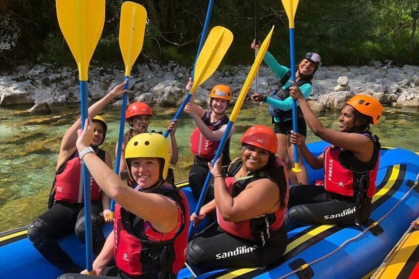 A group of people kayaking on a river. 2