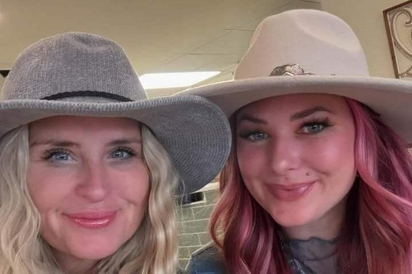 Two people wearing hats. 5