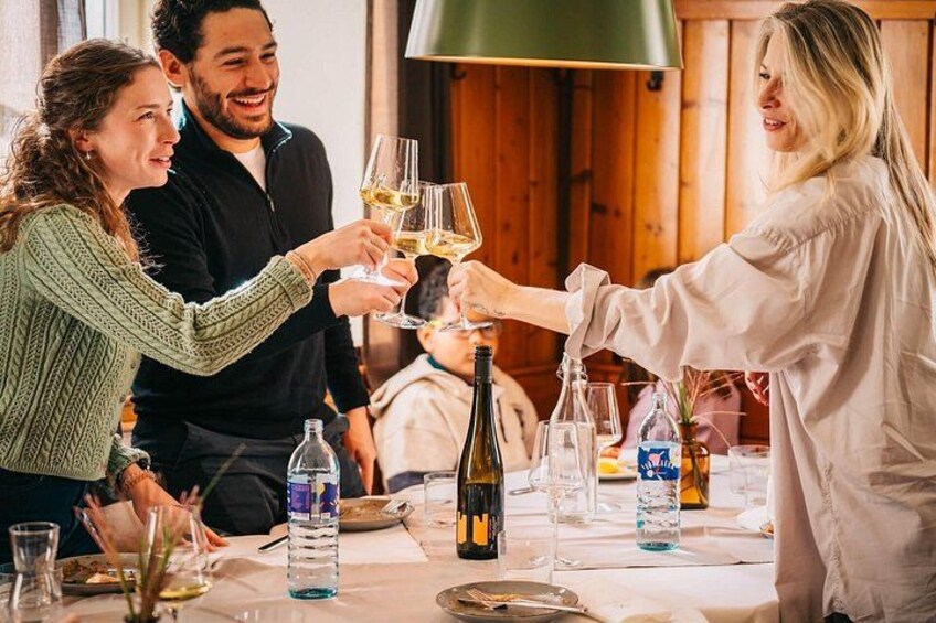 Raising a glass of Wachau wine during a relaxed private tasting lunch. 4