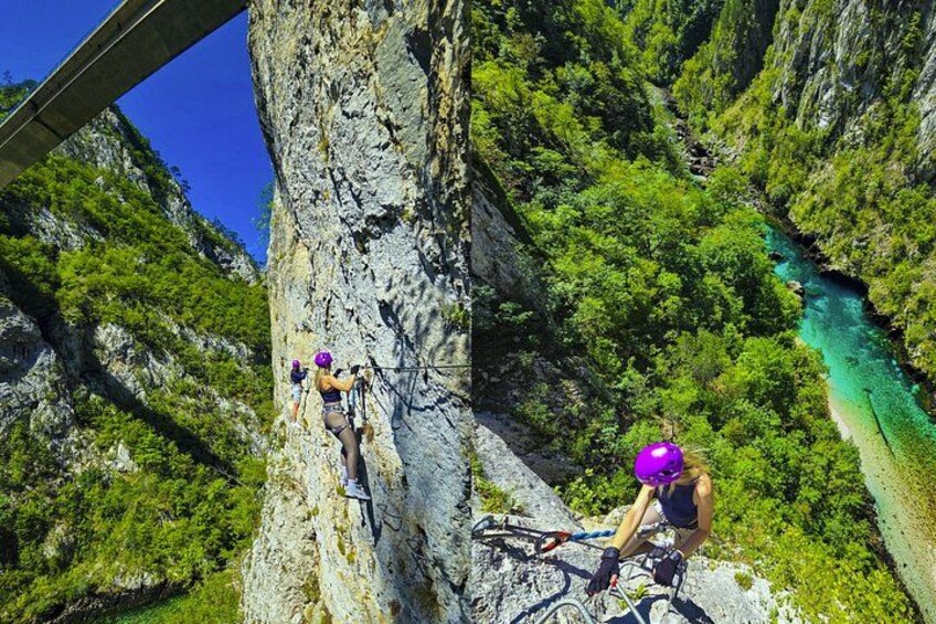 A person climbing a rocky cliff with a river below. 4