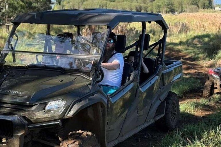 Guests enjoying a multi-rider ATV ride across our Hilo farm 3