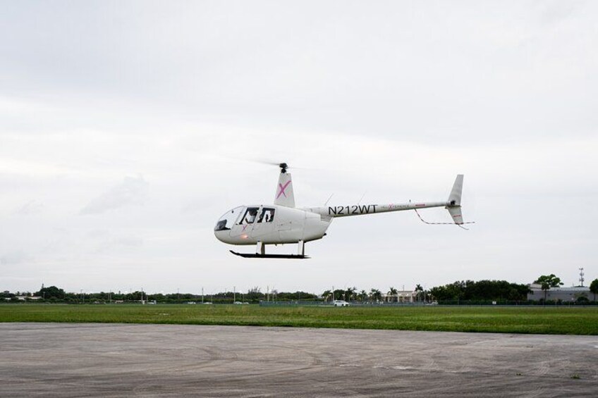 A helicopter with registration N212WT on a runway. 3