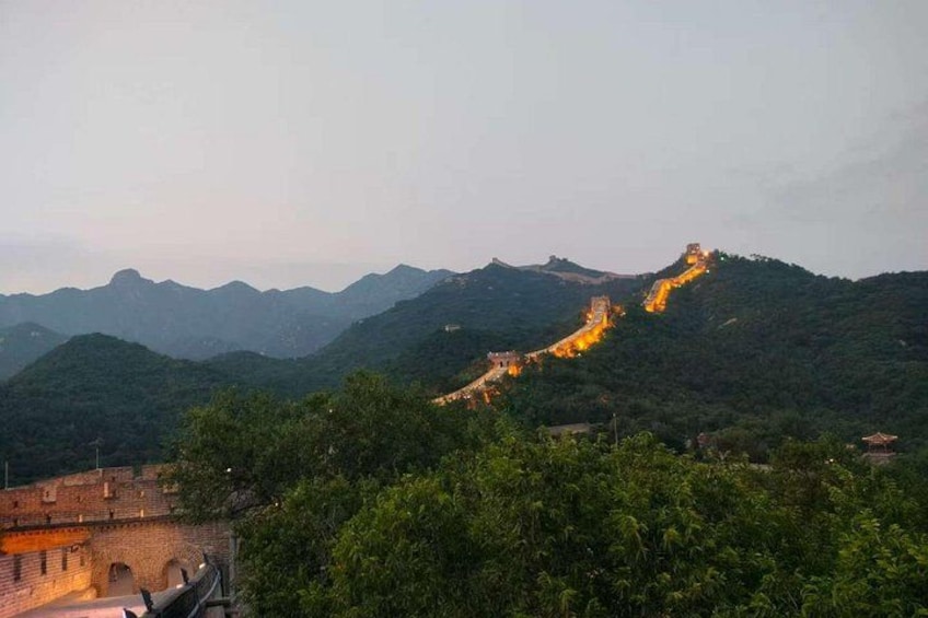 The Great Wall of China, a long structure winding through mountainous terrain. 4