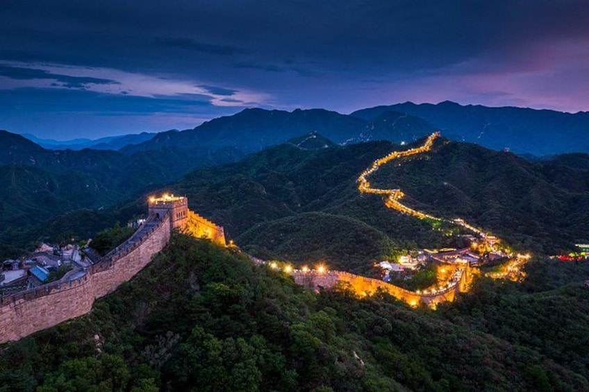 The Great Wall of China at dusk, winding through mountainous terrain. 2