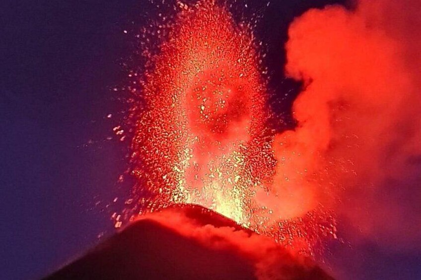 A volcanic eruption with lava and smoke. 4