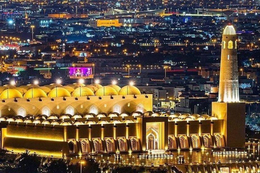 Night view of the mosque against the city lights 3