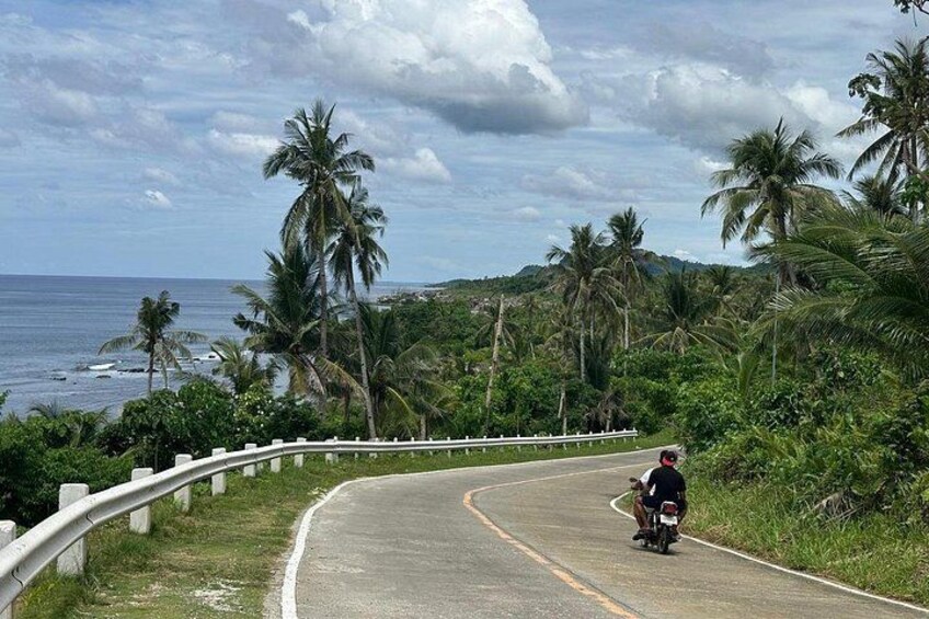 Little Hawaii Highway Coast" is a picturesque stretch of road on Siargao Island in the Philippines, located in the northern part of the island in the municipality of Burgos 5