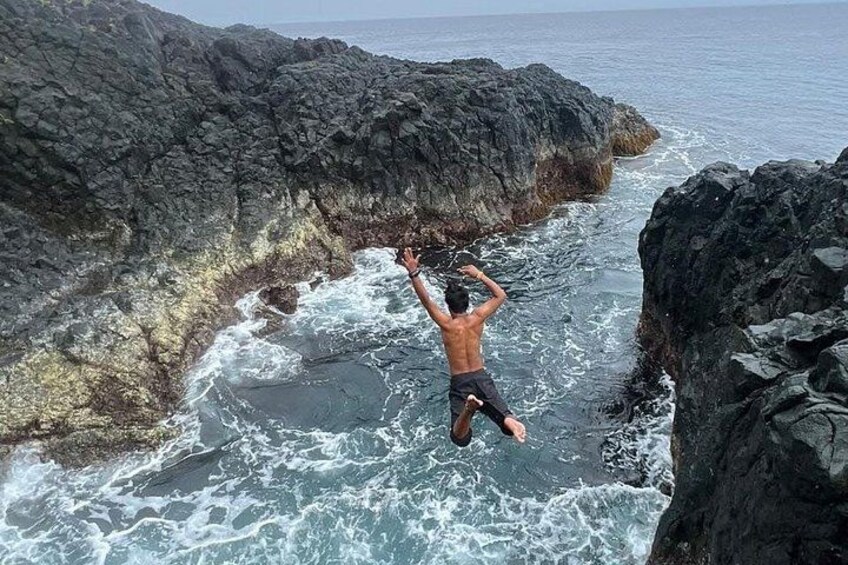 Hagukan Diving Spot: This is a unique rock formation where the waves from the Pacific Ocean crash against the cliffs, creating a turbulent, deep pool. 1