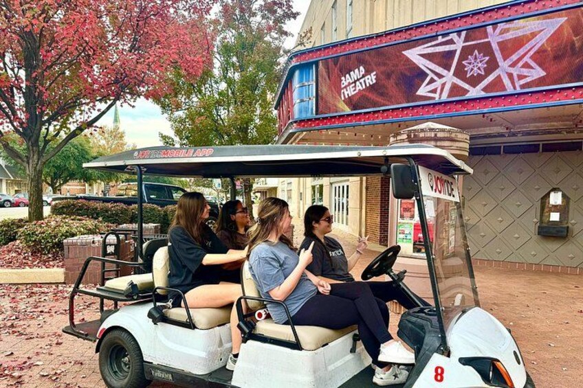 Learn about historic Downtown Tuscaloosa on a fun golf cart ride that stops up close to buildings so you don't need to walk! (Pictured: Bama Theatre) 4