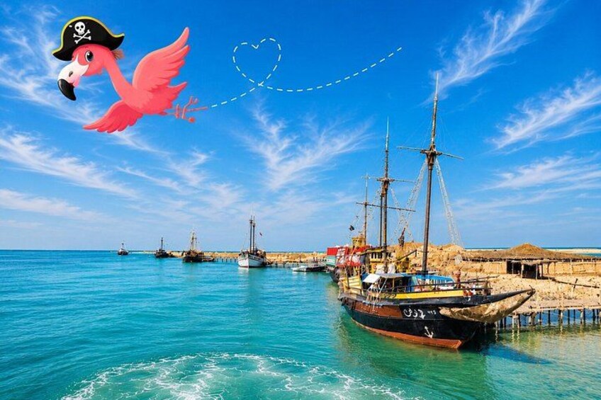 A coastal scene with a large sailing ship docked at a pier, a flamingo, and a clear blue sky. 1