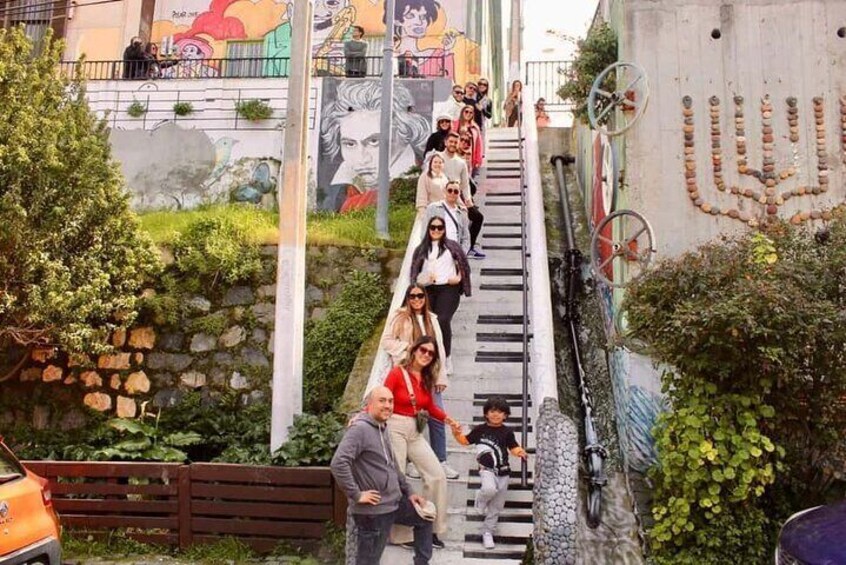 A staircase with people ascending and descending. 4