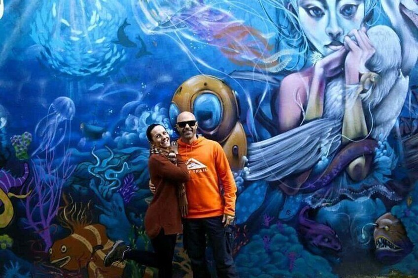 A mural with an underwater scene, including a diver and a mermaid. 2