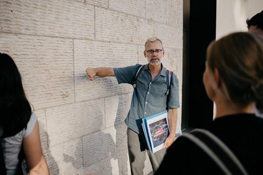 Materiality defines the design: from solid, textured natural stone to sleek glass façades. 5