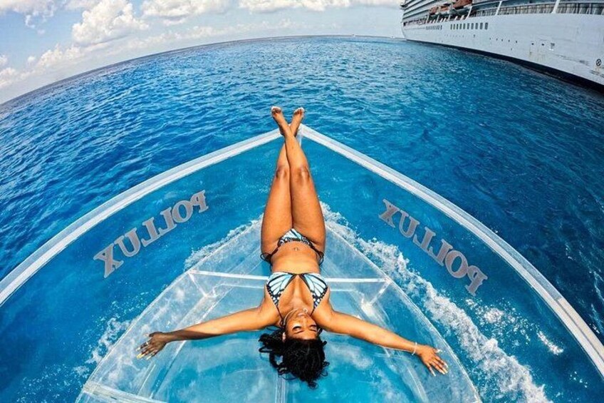 A person floating on a transparent pool with the word 'POLYX' on the sides, surrounded by blue water. 4