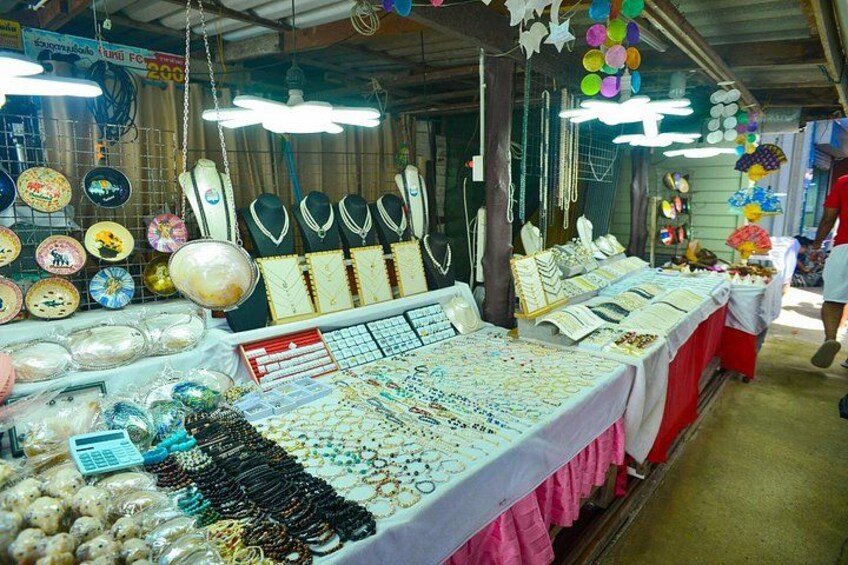 A jewelry market with various items on display. 2