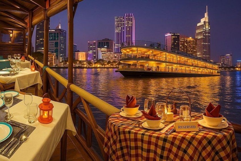 A table set for a meal with a city skyline and a riverboat in the background. 5