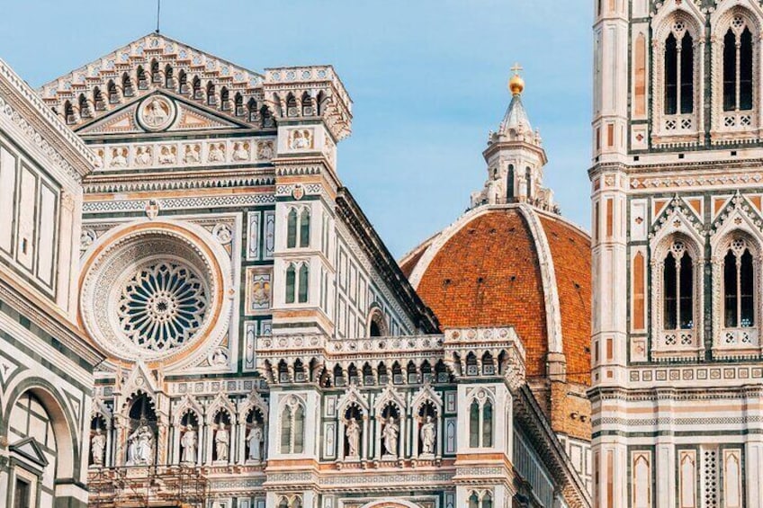 The Florence Cathedral with its intricate facade and large rose window. 5