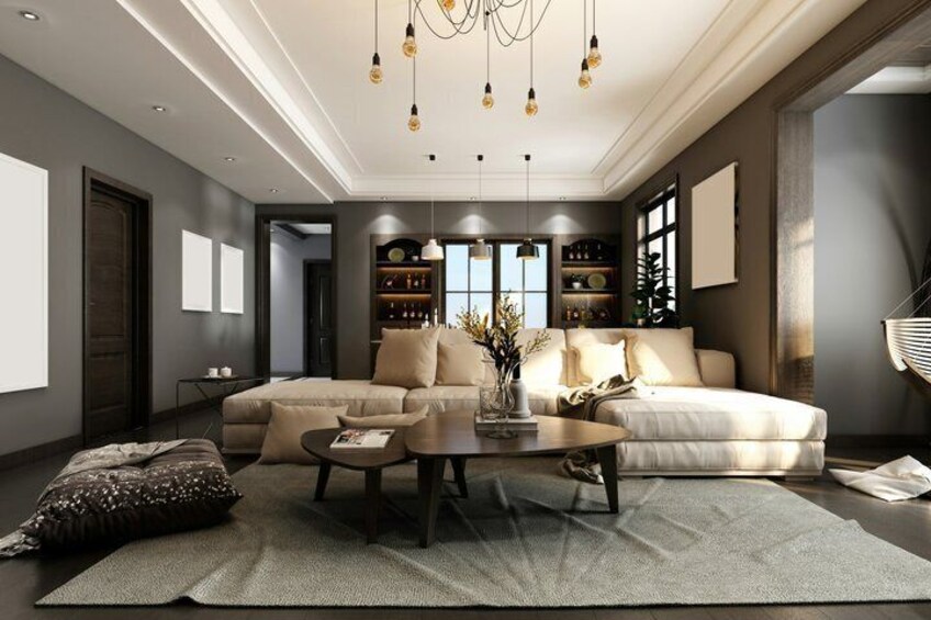 Una sala moderna con sofá, mesa de centro y objetos decorativos. 3