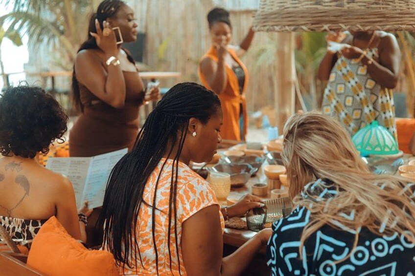 Sisterhood in session — crafting strands, weaving bonds. 4