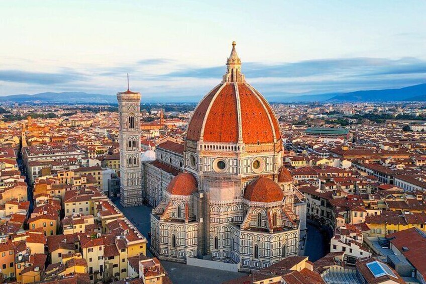 The Florence Cathedral with its distinctive red dome and adjacent bell tower. 1
