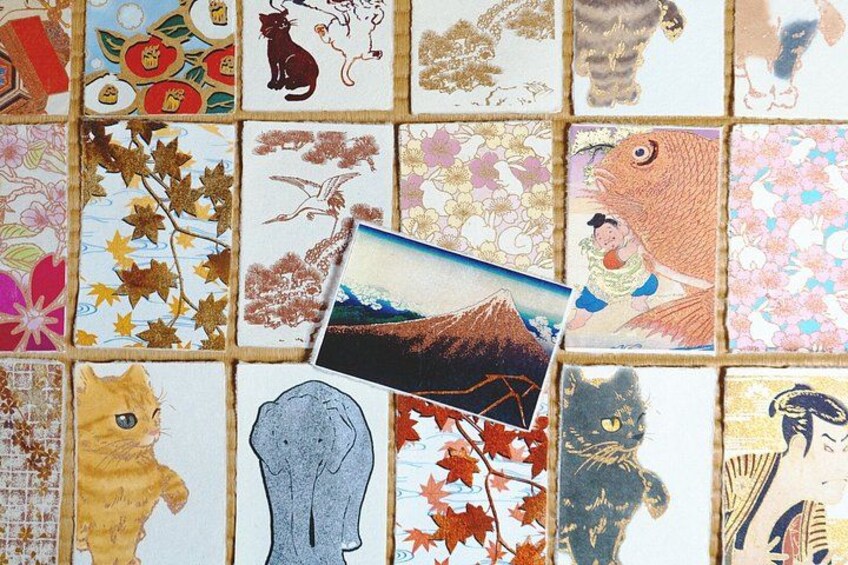 A collection of variously colored tiles with different patterns and designs, including some with animal illustrations. 4