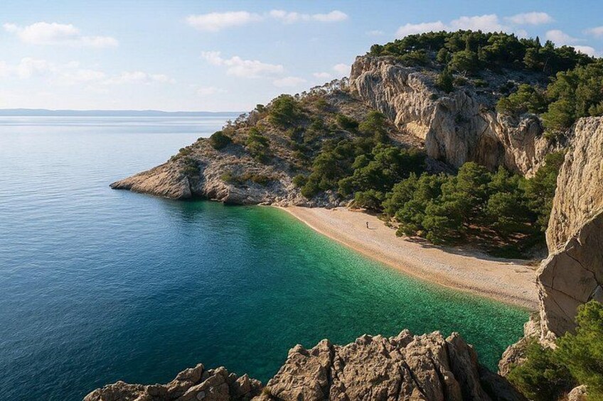 Nugal Beach (1st stop, 10 min photoshoot) – dramatic cliffs, pine forests, and turquoise water make this hidden gem unforgettable. 2