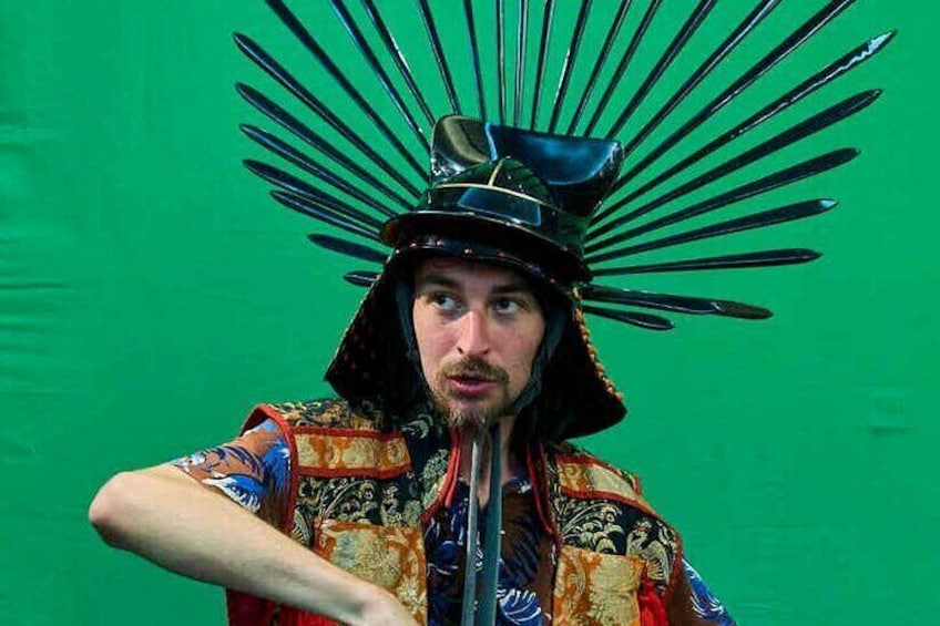 Try on a shogun helmet and take a photo 5