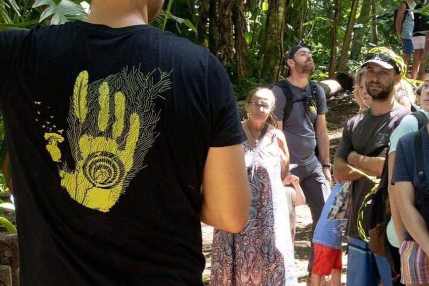A group of people in a forested area. 5