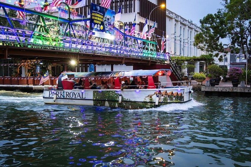 A boat named 'Park Royal' with colorful decorations and flags, moving on water. 4
