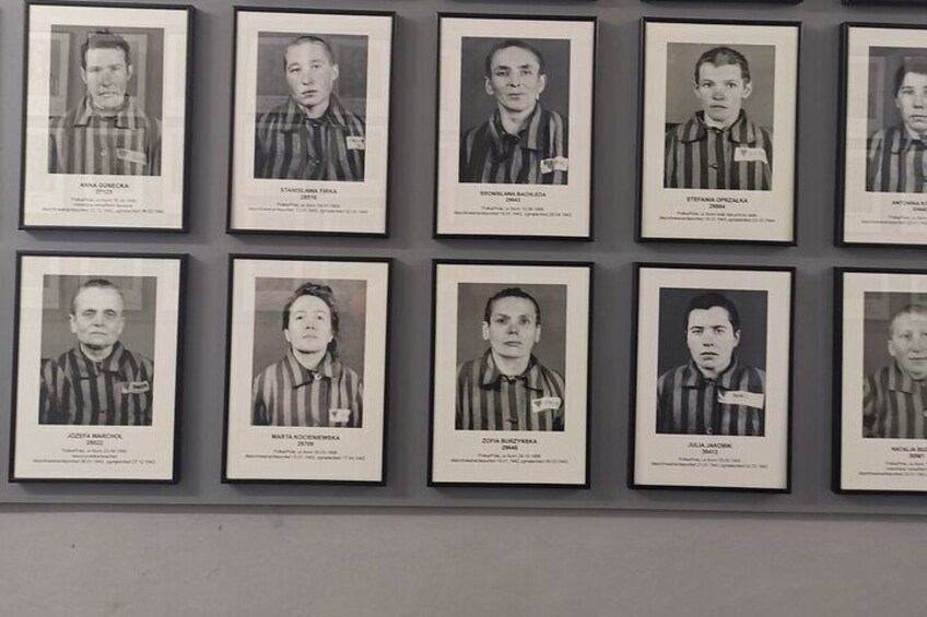 A wall of framed photographs of individuals in striped uniforms. 2